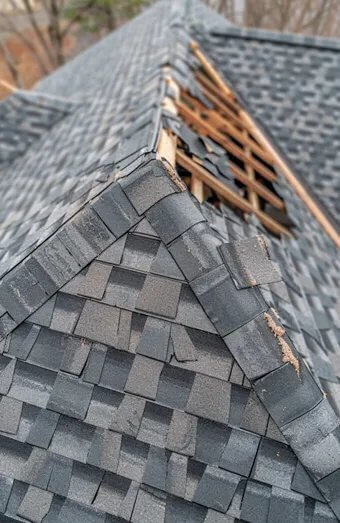 Storm Damage Roof Repair X